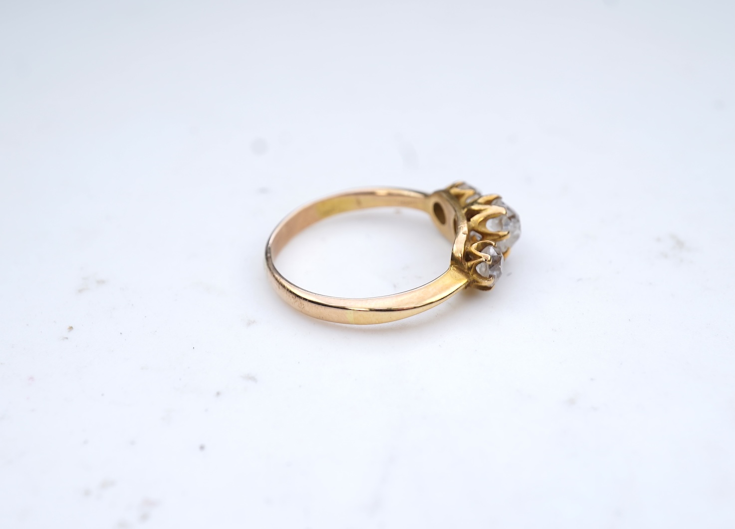 A three-stone diamond ring, early 20th century
